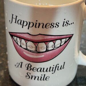 Happiness is a Beautiful Smile Heat-activated changing mug